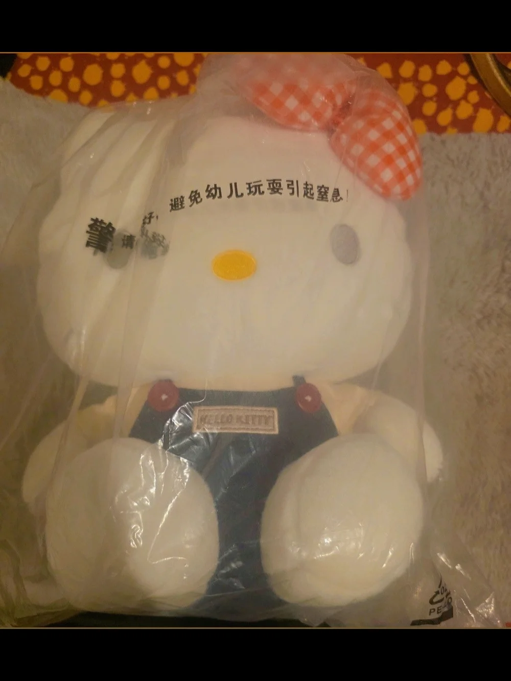 Hello Kitty White Plush with Orange Gingham Bow and Navy Overalls
